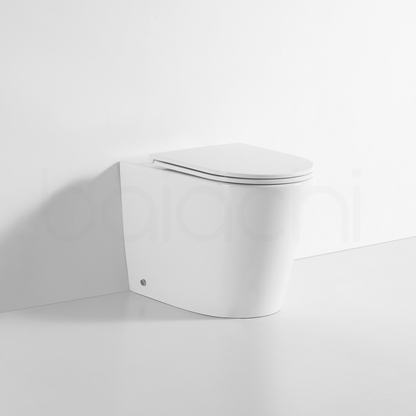 Ballina Rimless In Wall Toilet Suite with Round Brushed Nickel Flushing Buttons