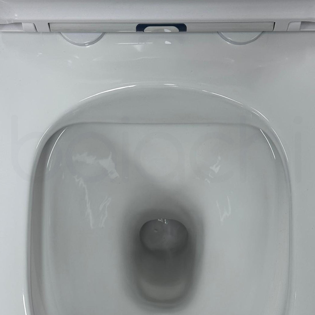 Ballina Rimless In Wall Toilet Suite with Round Stainless Steel Gun Metal Flushing Buttons